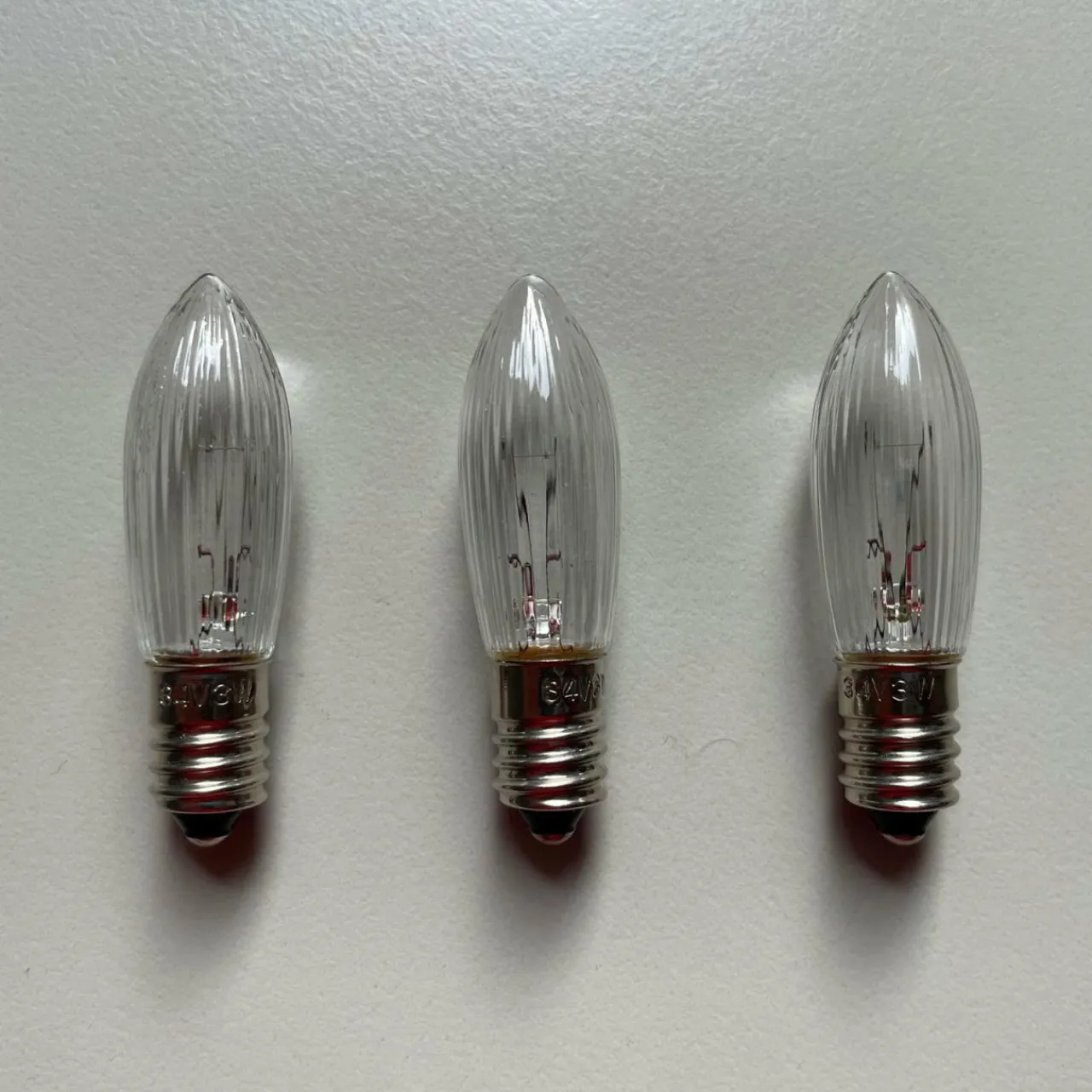 ampoule_bougie_e_par__pour_arcs_lumineux_0.webp Saico Ampoule bougie E10 par 3 pour arcs lumineux^ Lumière De Noël
