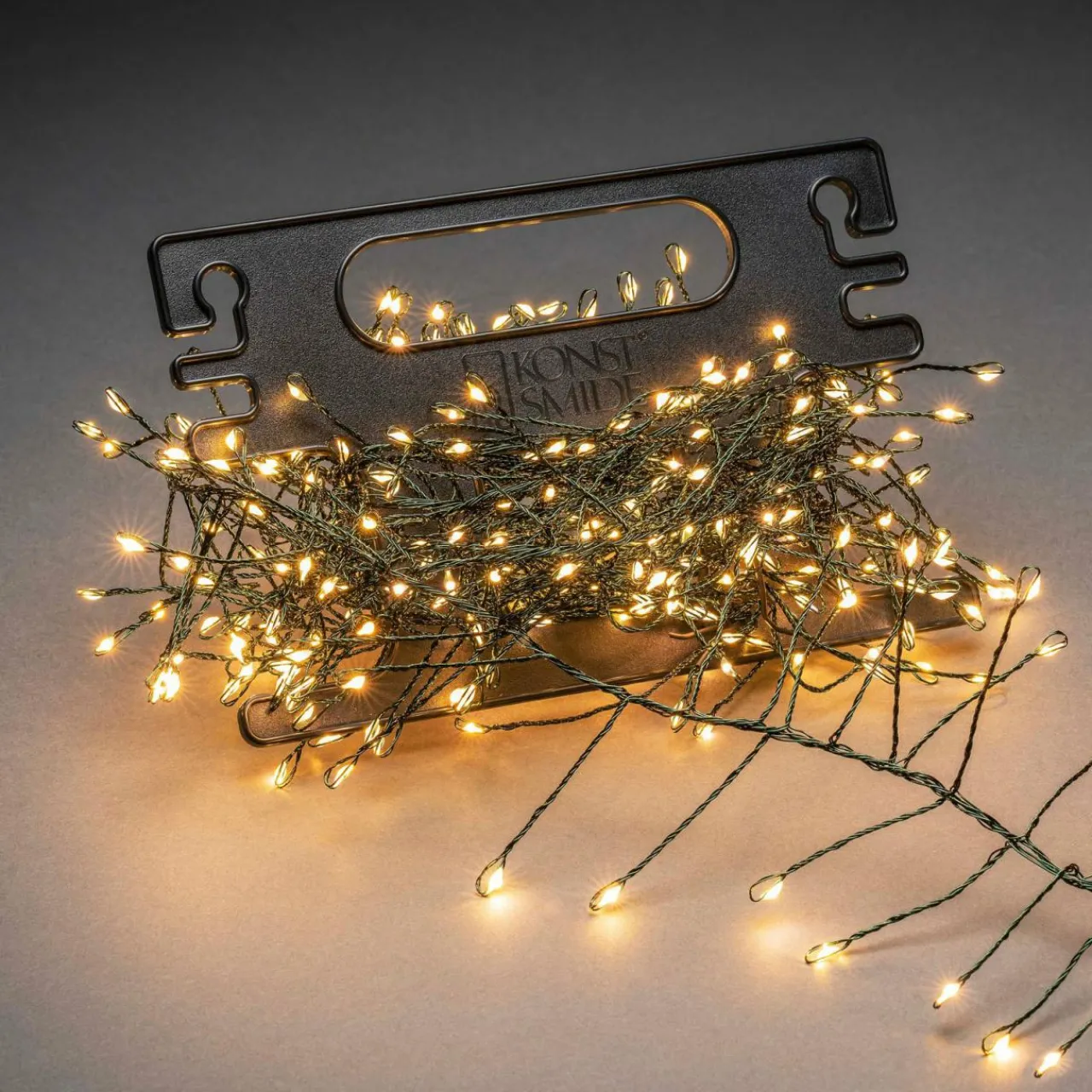 guirlande_cluster_verte_enrouleur__lampes_0.webp Konstsmide Christmas Guirlande Cluster verte enrouleur 400 lampes^ Lumière De Noël