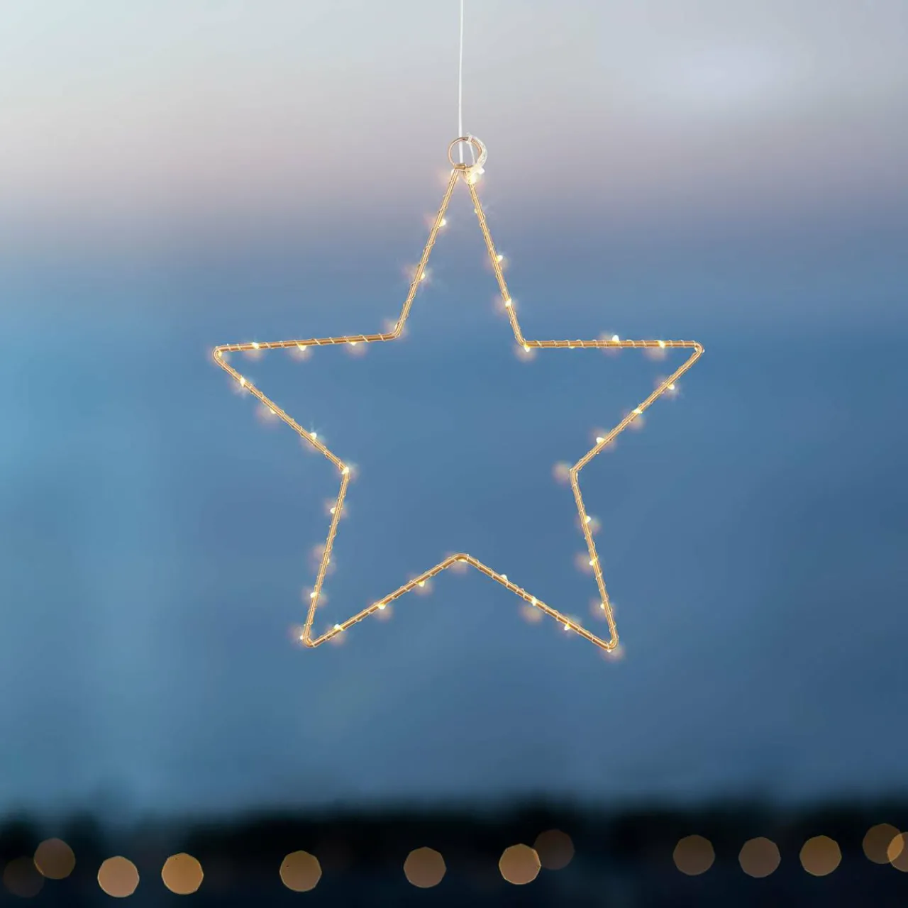 toile_dco_led_liva_star_dore__cm_3.webp Sirius Étoile déco LED Liva Star, dorée, Ø 30 cm^ Lumière De Noël